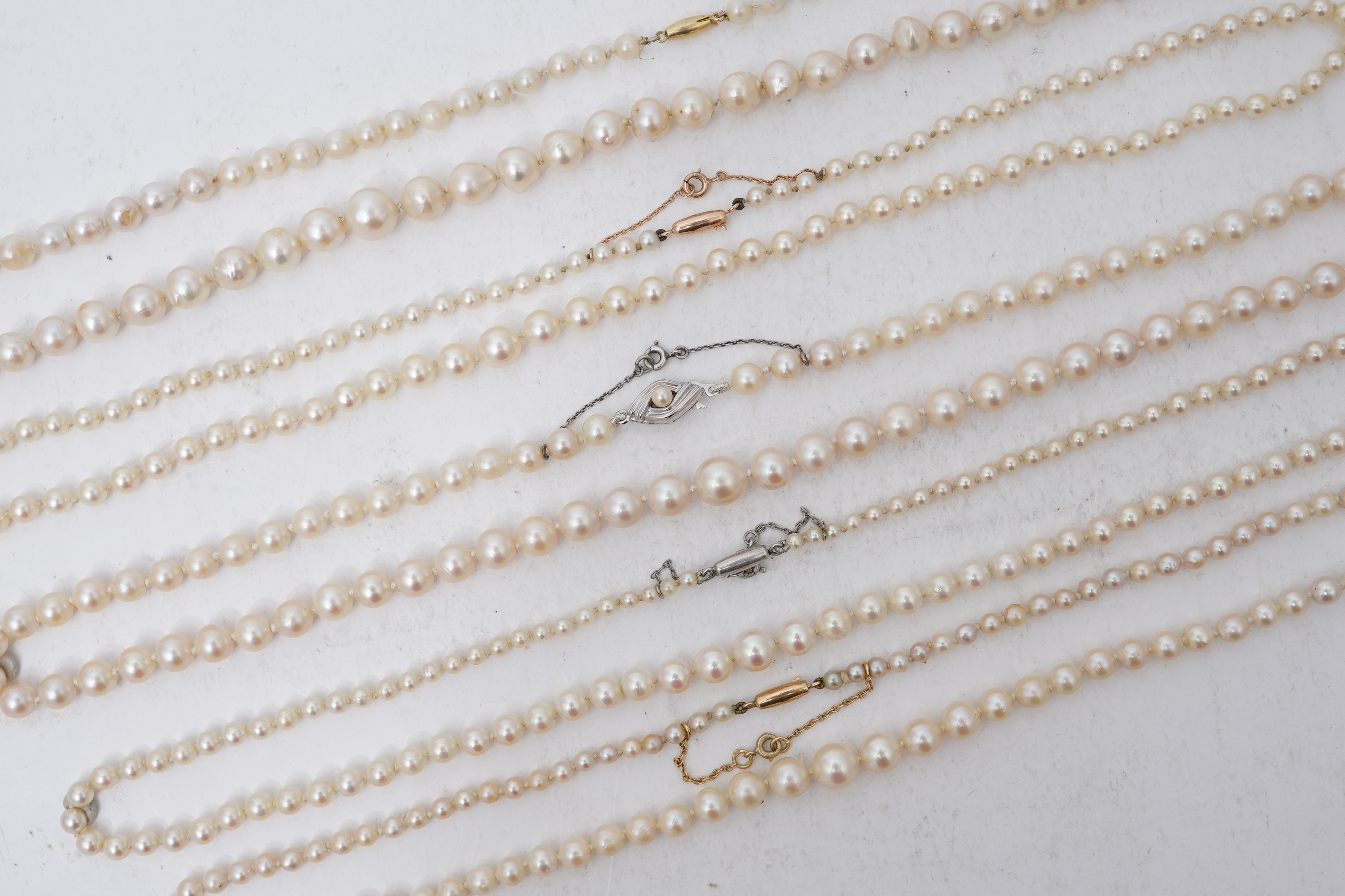 Five cultured pearl necklaces